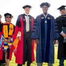 Group of faculty members pose for photo