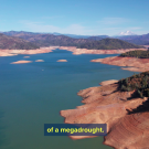 aerial view of a mostly empty reservoir 