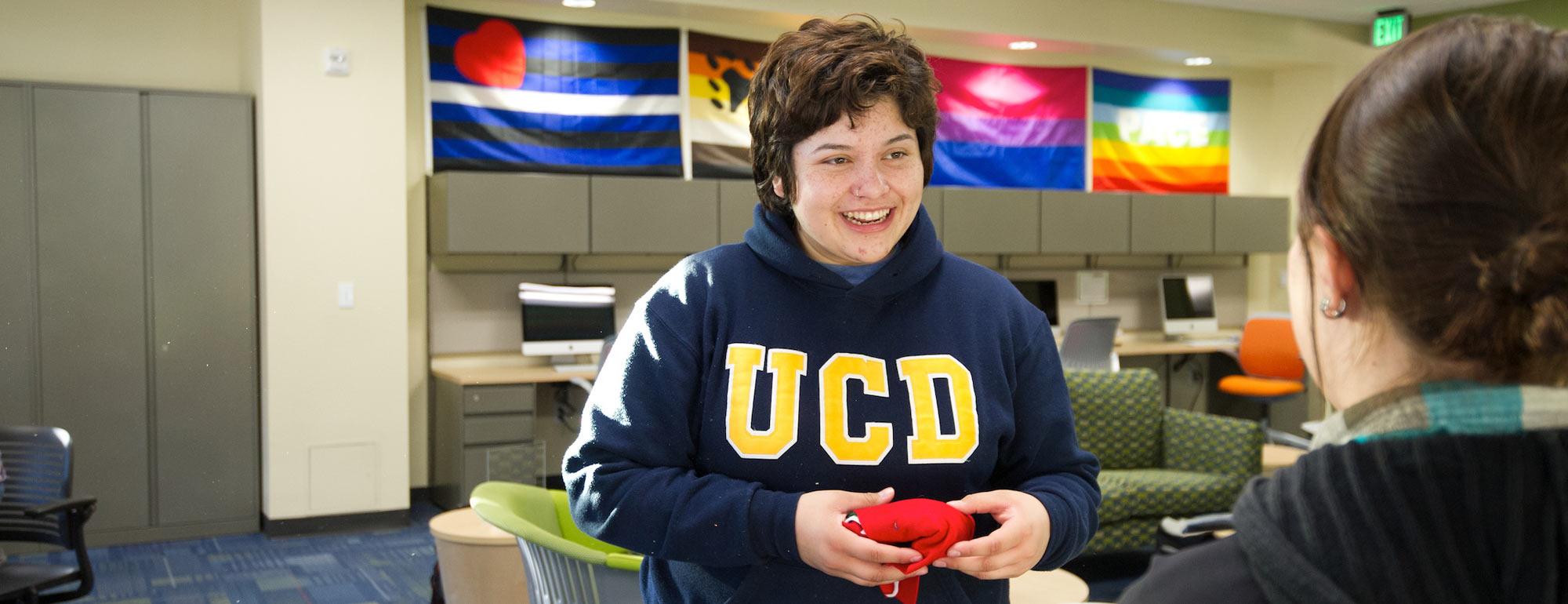 A female student smiles for the camera