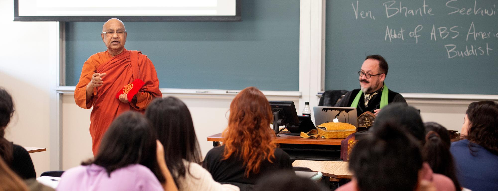 A buddhist monk addresses a UC Davis religious studies class