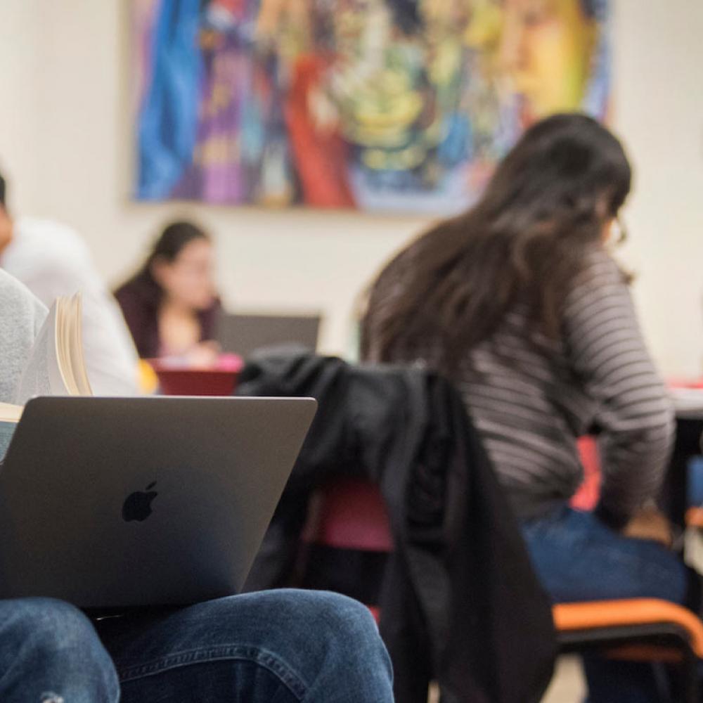 A male student studies at the Cross Cultural Center