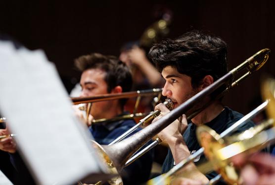 Students playing trombones.