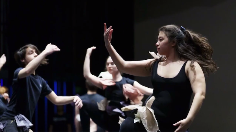 Student dancers dancing on stage.