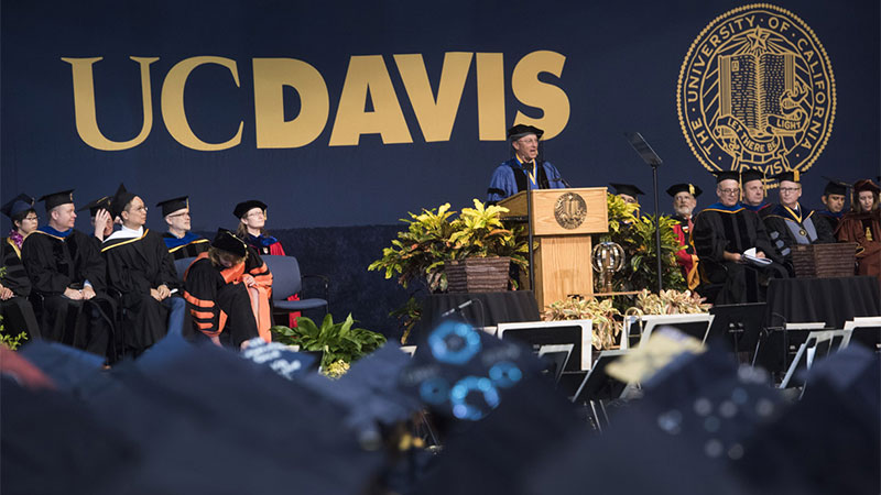 Interim Chancellor Ralph Hexter speaking at a commencement