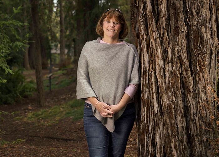 Beth Foraker by a redwood tree