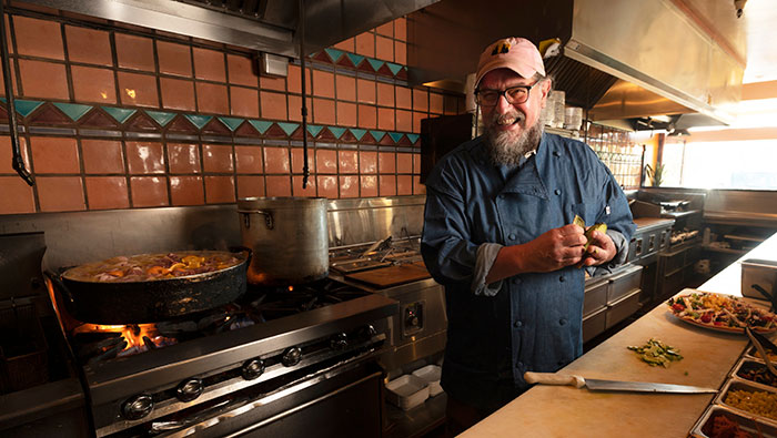 Alumnus Mark Casale in the kitchen at Dos Coyotes