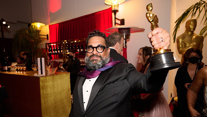 Joseph Patel holds his Oscar
