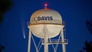 Comet passes by UC Davis water tower