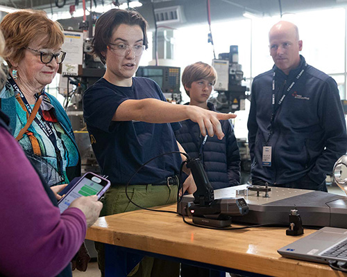 Student demonstrates equipment at engineering center